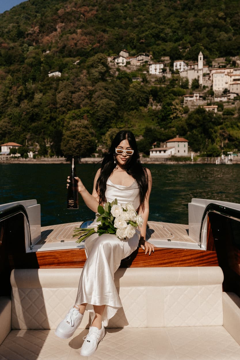 Elopement wedding Lake Como boat ride couple photoshoot Italy destination wedding photographer videographer