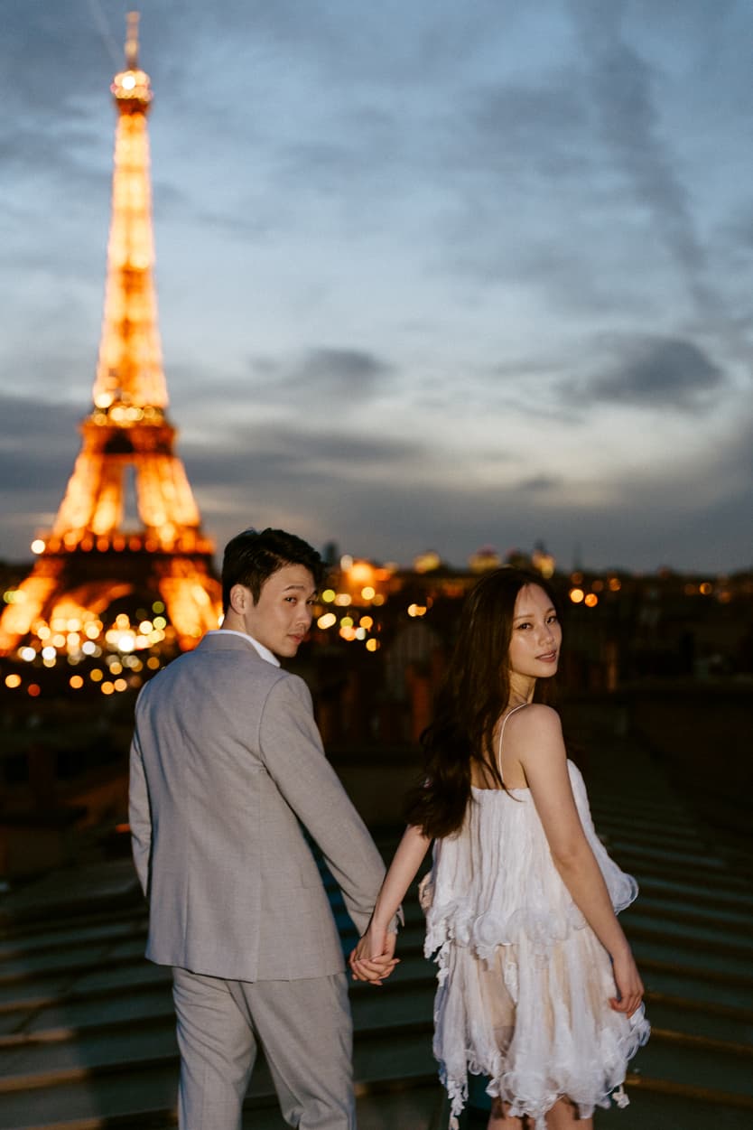 Couples Sunset Pre-wedding Photoshoot in Parisian rooftop with Eiffel tower view 
