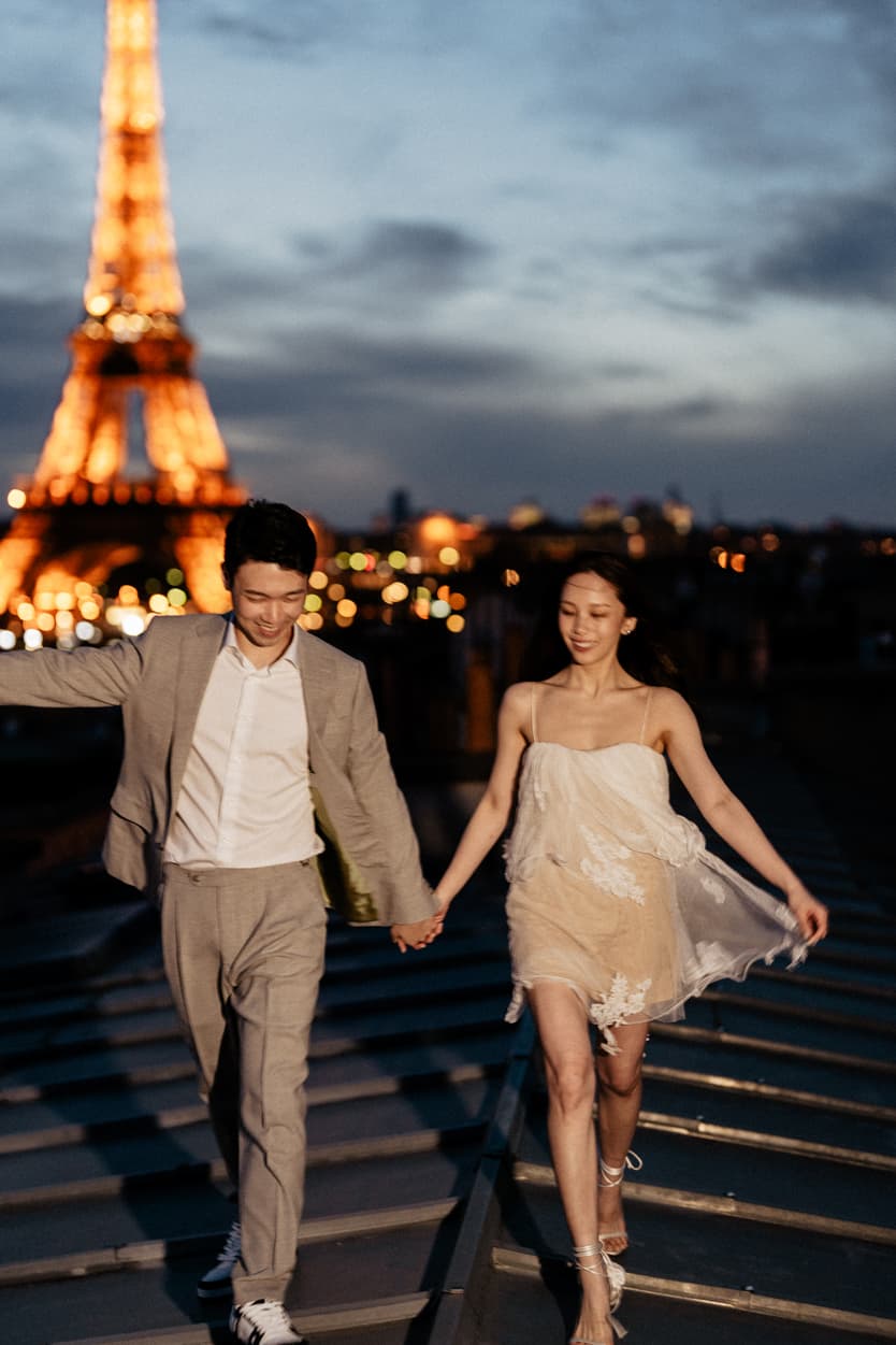 Couples Sunset Pre-wedding Photoshoot in Parisian rooftop with Eiffel tower view 
