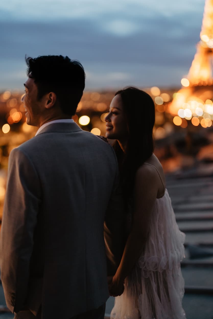 Couples Sunset Pre-wedding Photoshoot in Parisian rooftop with Eiffel tower view 
