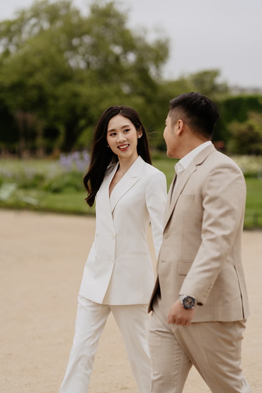 Couple full-day Pre-wedding Photoshoot in Paris Tuileries Garden matching suits