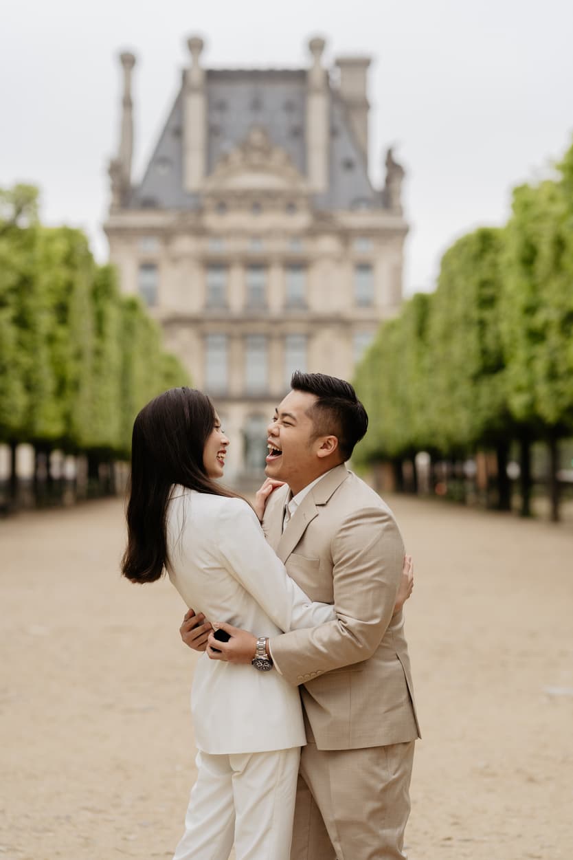 Couple full-day Pre-wedding Photoshoot in Paris Tuileries Garden matching suits