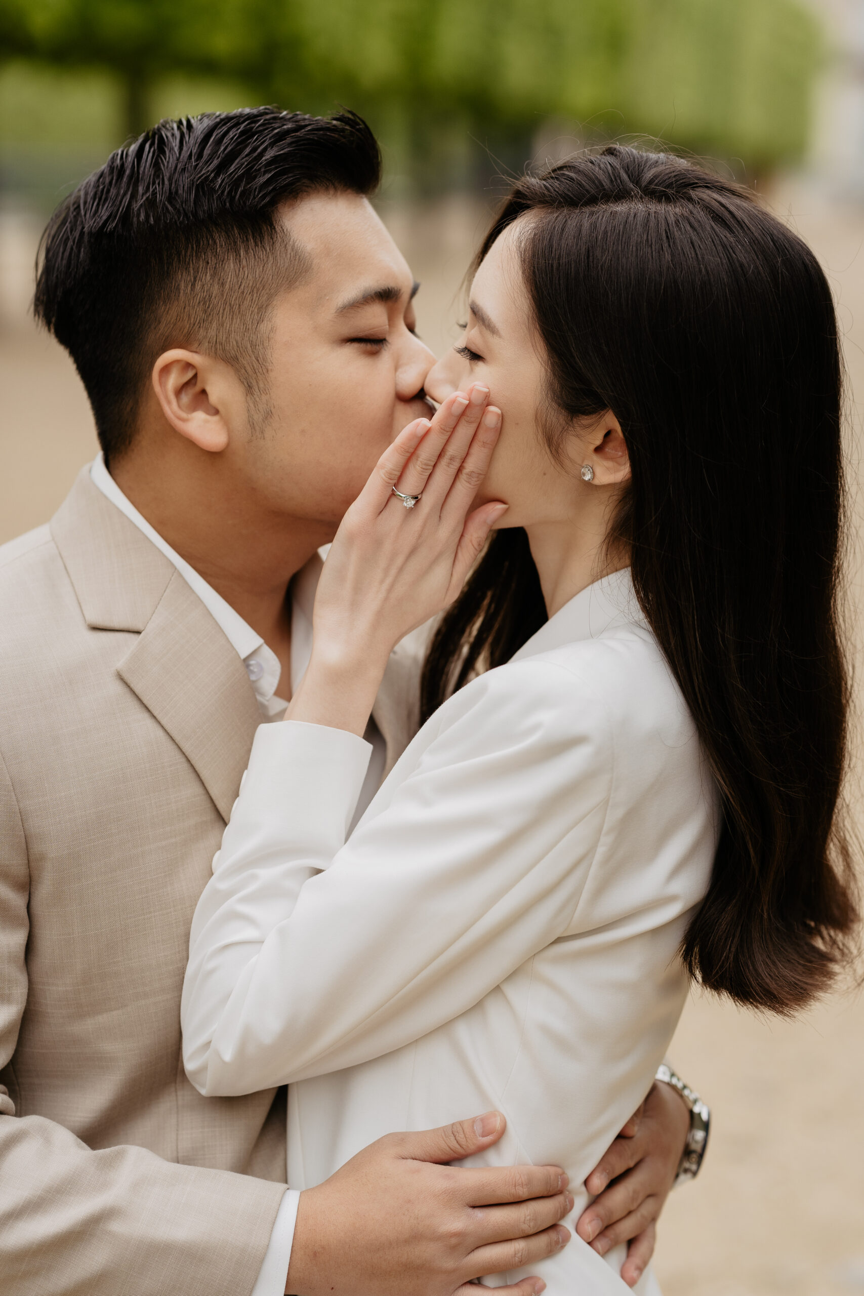 Couple full-day Pre-wedding Photoshoot in Paris Tuileries Garden matching suits 