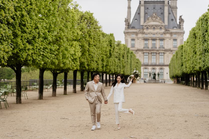 Couple full-day Pre-wedding Photoshoot in Paris Tuileries Garden matching suits