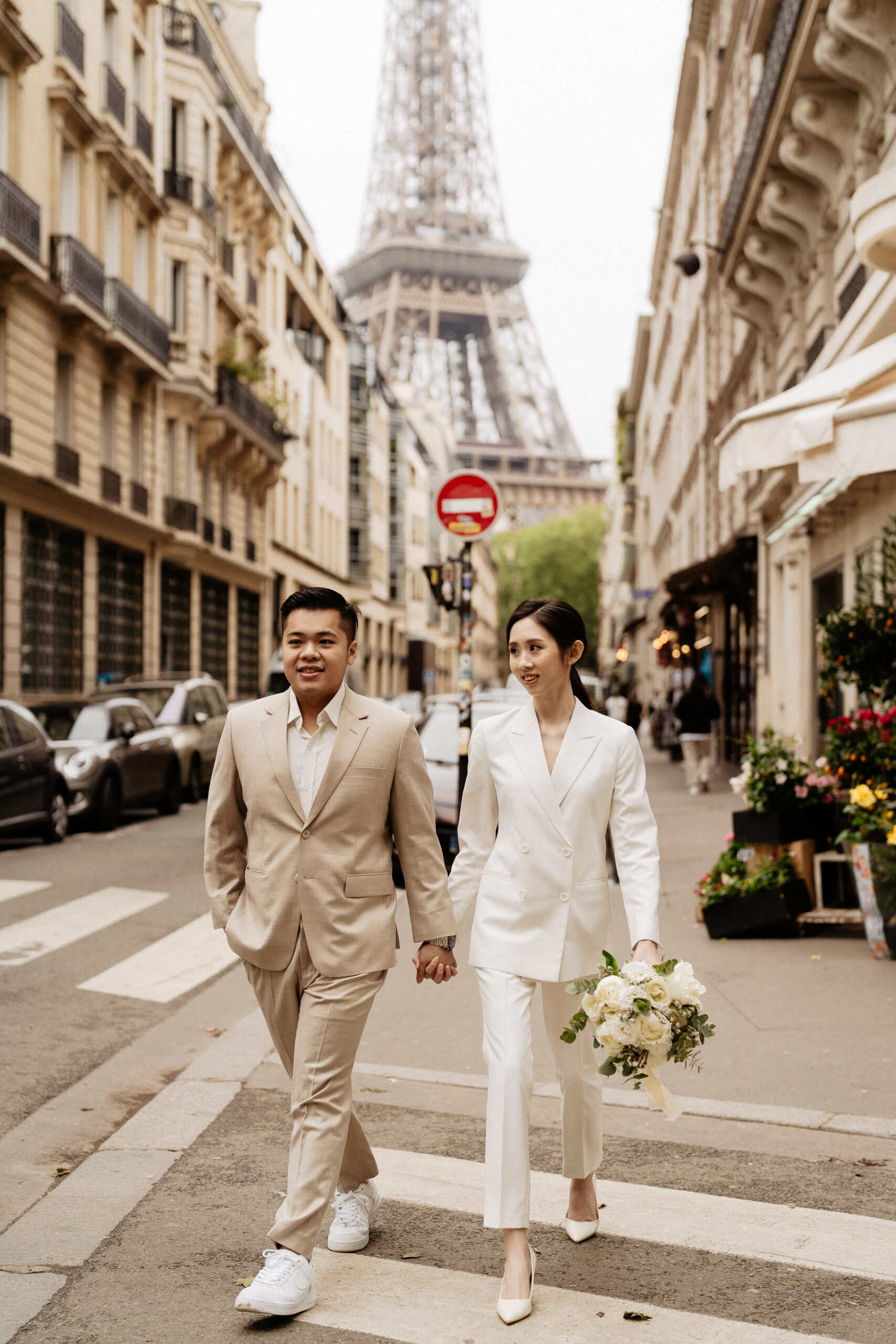 Couple full-day Pre-wedding Photoshoot in Paris with Eiffel Tower view matching suits