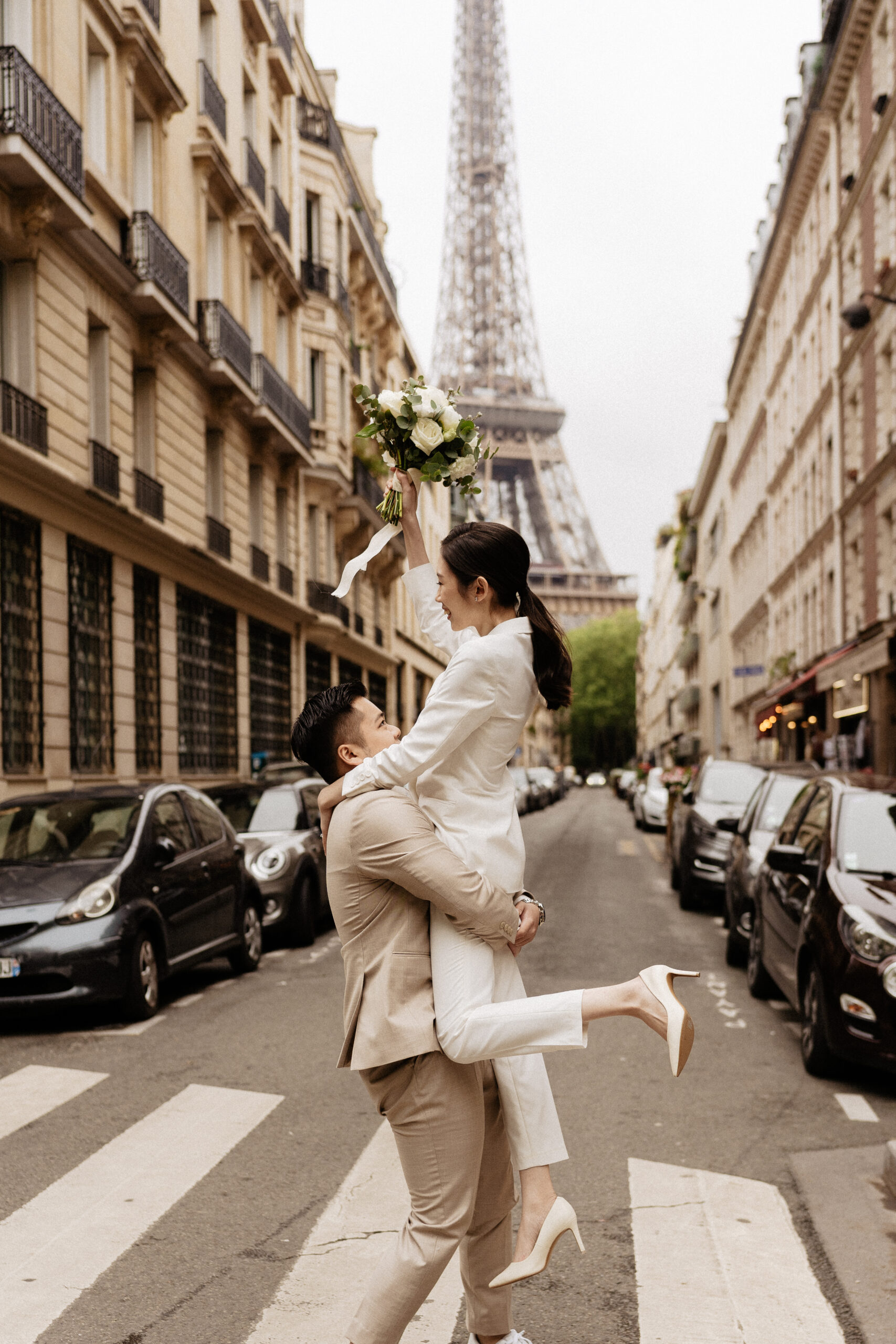 Couple full-day Pre-wedding Photoshoot in Paris with Eiffel Tower view matching suits