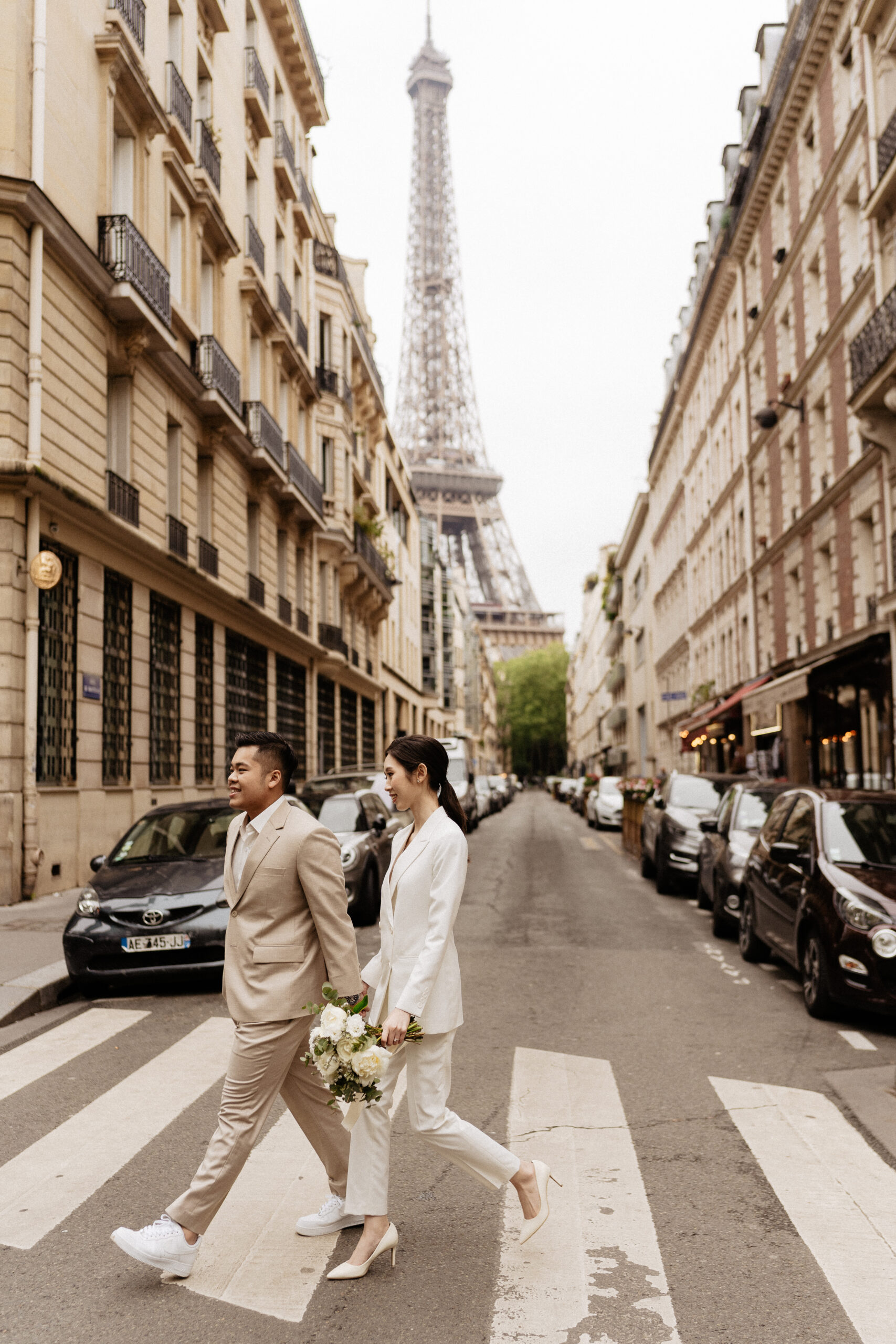 Couple full-day Pre-wedding Photoshoot in Paris with Eiffel Tower view matching suits