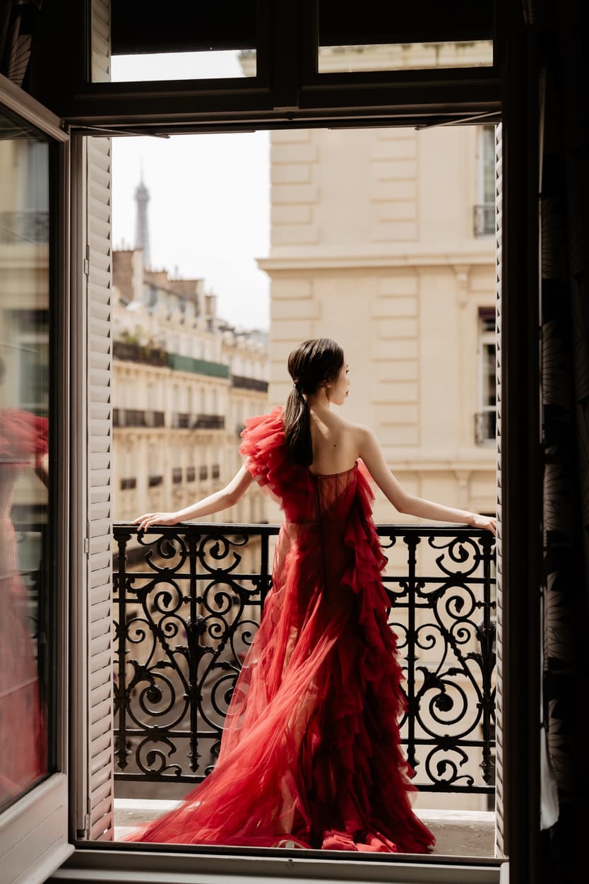 Couple full-day Pre-wedding Photoshoot in Paris hotel balcony, bride with red dress