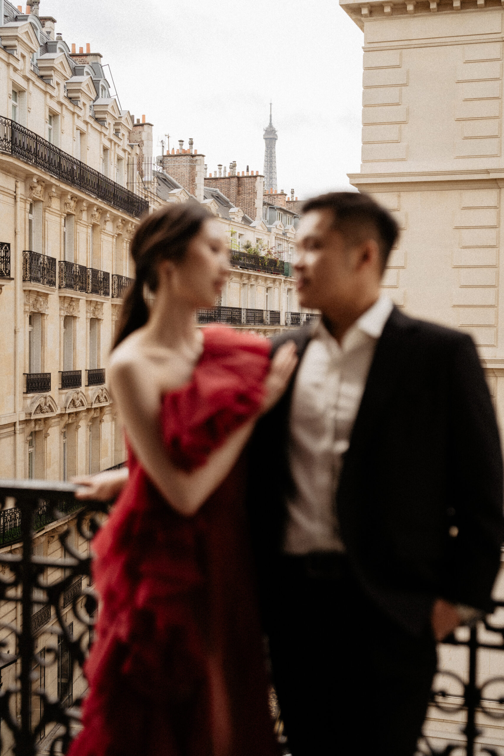 Couple full-day Pre-wedding Photoshoot in Paris hotel balcony, bride with red dress 