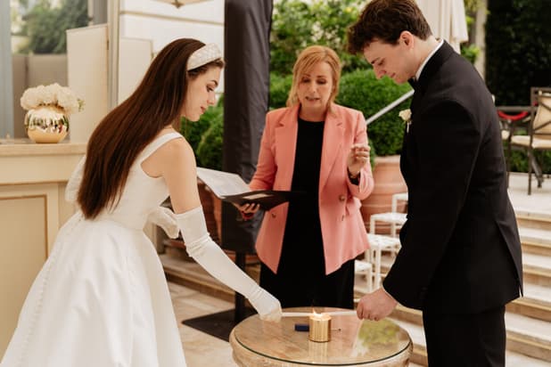 Destination wedding elopement at the luxurious Ritz Paris garden ceremony candle ritual