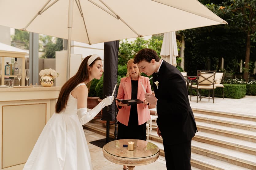 Destination wedding elopement at the luxurious Ritz Paris garden ceremony candle ritual