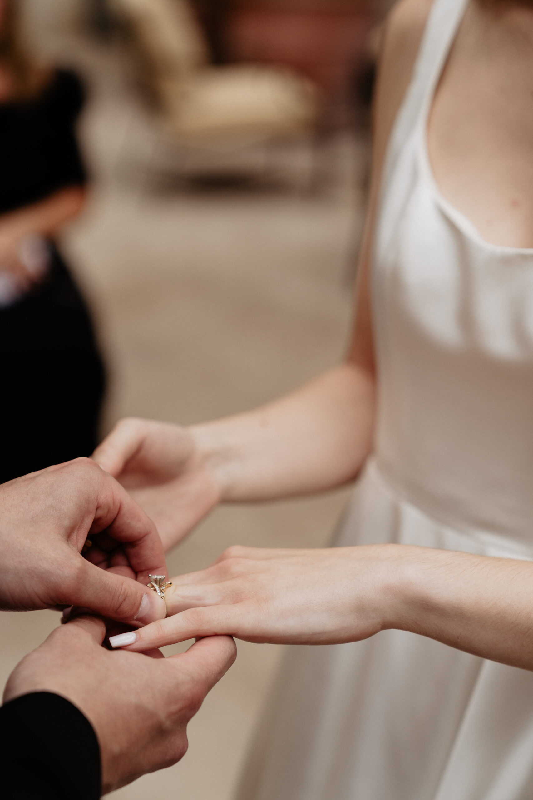 Destination wedding elopement at the luxurious Ritz Paris garden ceremony exchanging rings 
