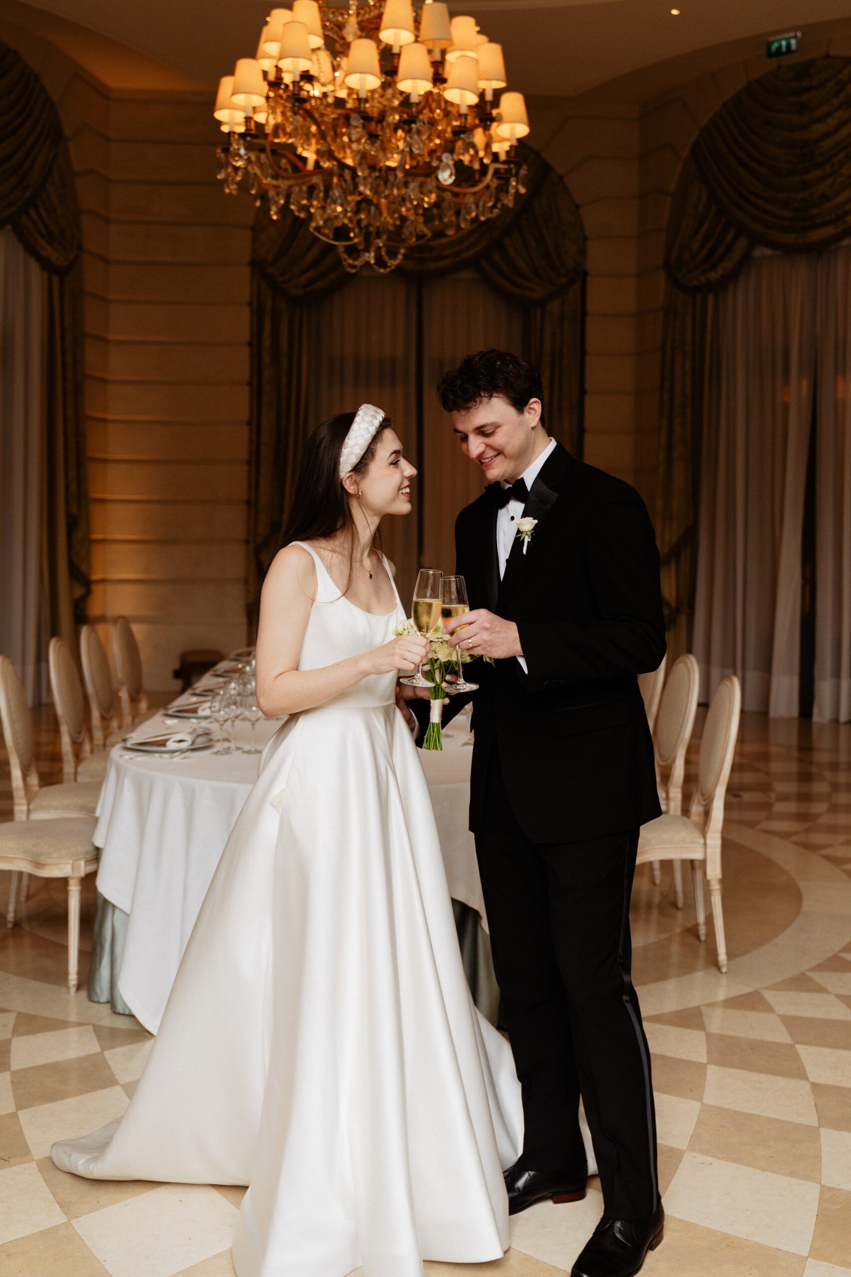 Destination wedding elopement at the luxurious Ritz Paris couple toasting after the ceremony 
