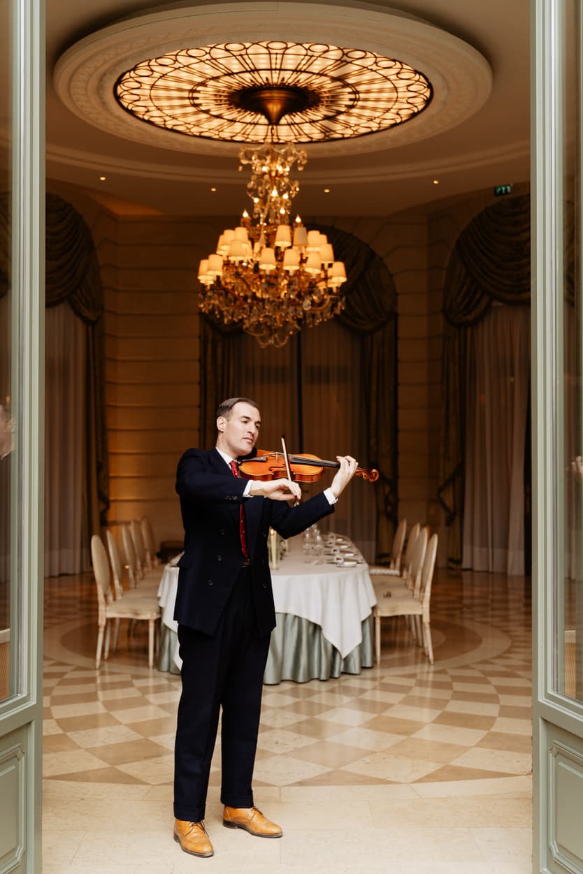 Destination wedding elopement at the luxurious Ritz Paris violinist