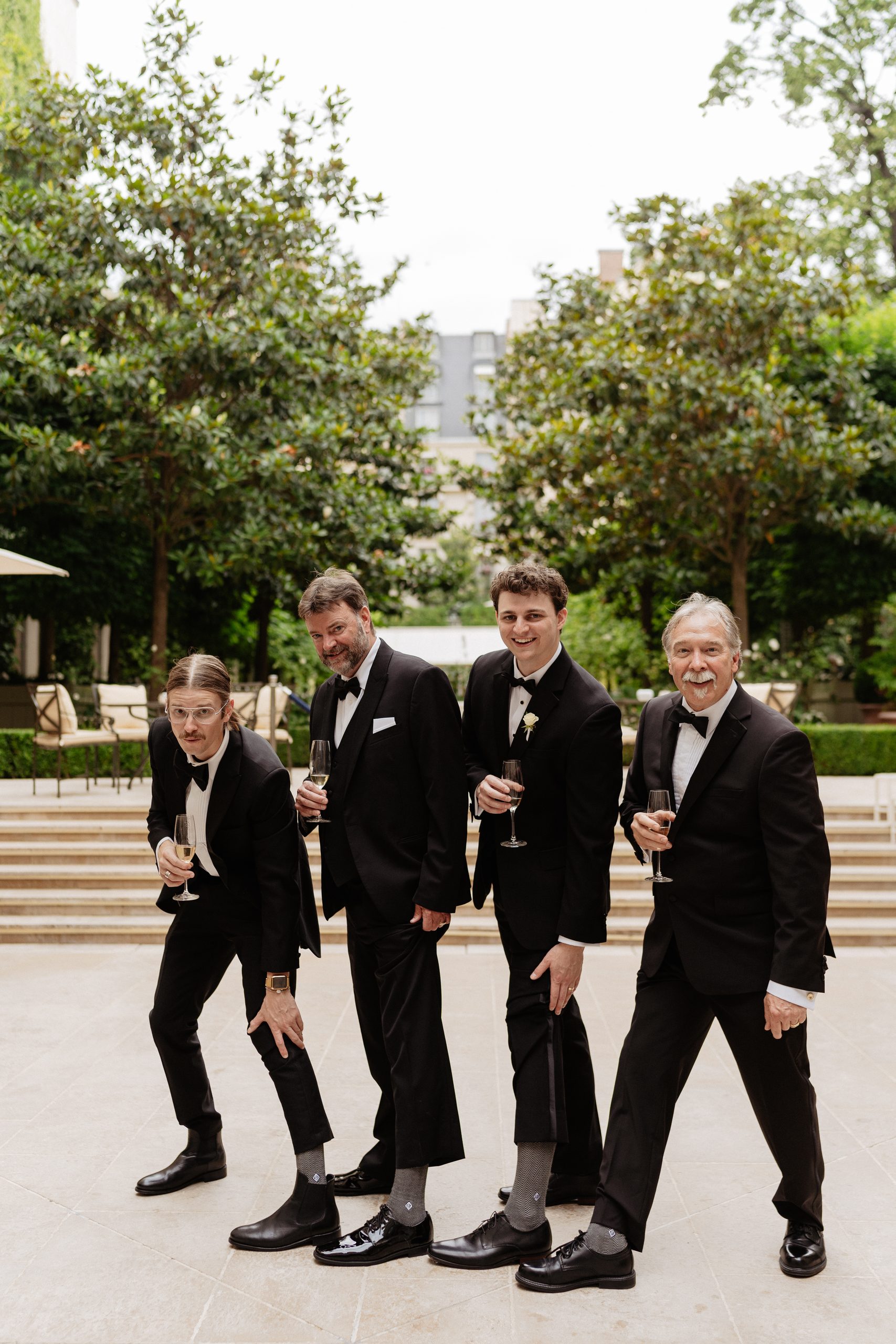 Destination wedding elopement at the luxurious Ritz Parisgroom with guests same socks 