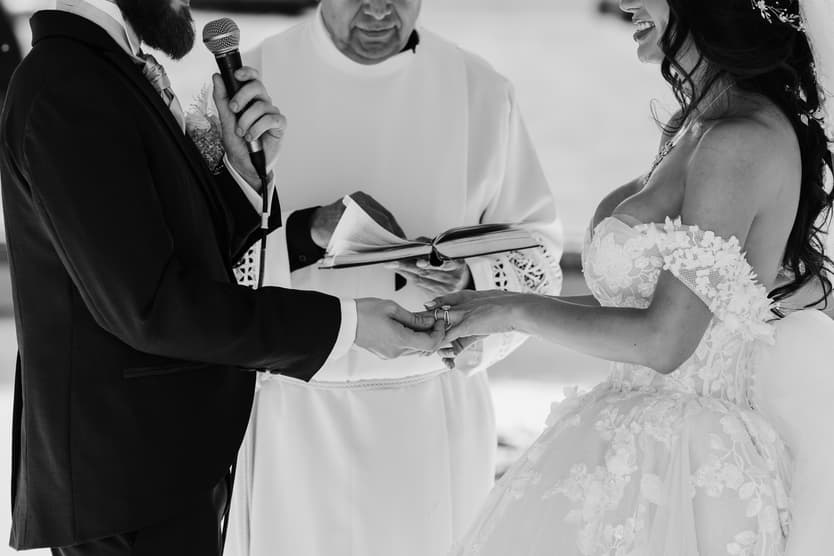 The rings exchanged at the outdoor ceremony, in black and white