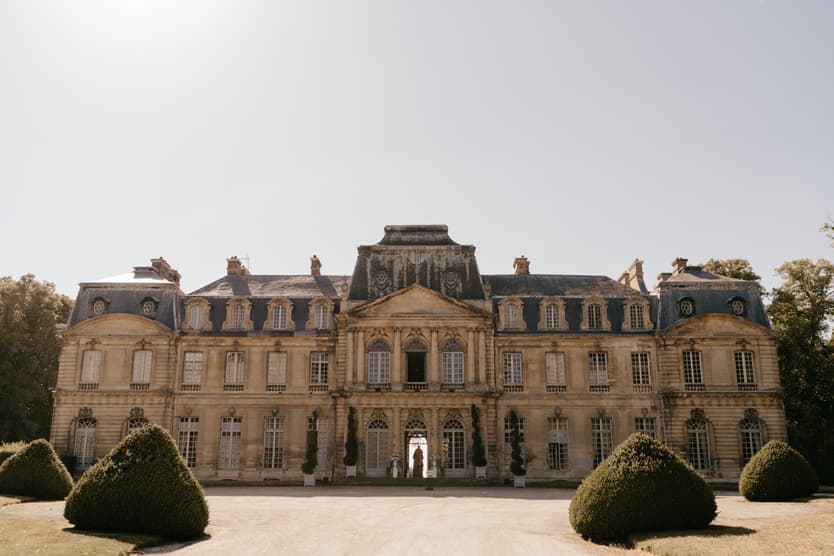 Château de Champlâtreux in full sun, the wedding venue an hour north of Paris