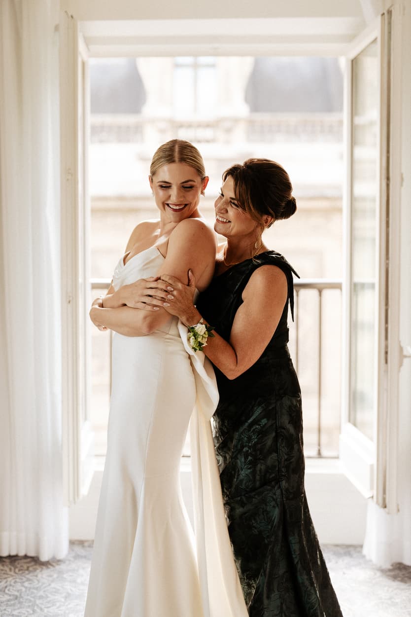 Destination elopement wedding Paris preparations Hotel du Louvre bride with mom