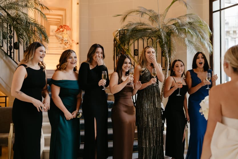 Destination elopement wedding Paris Hotel du Louvre first look with bridesmaids