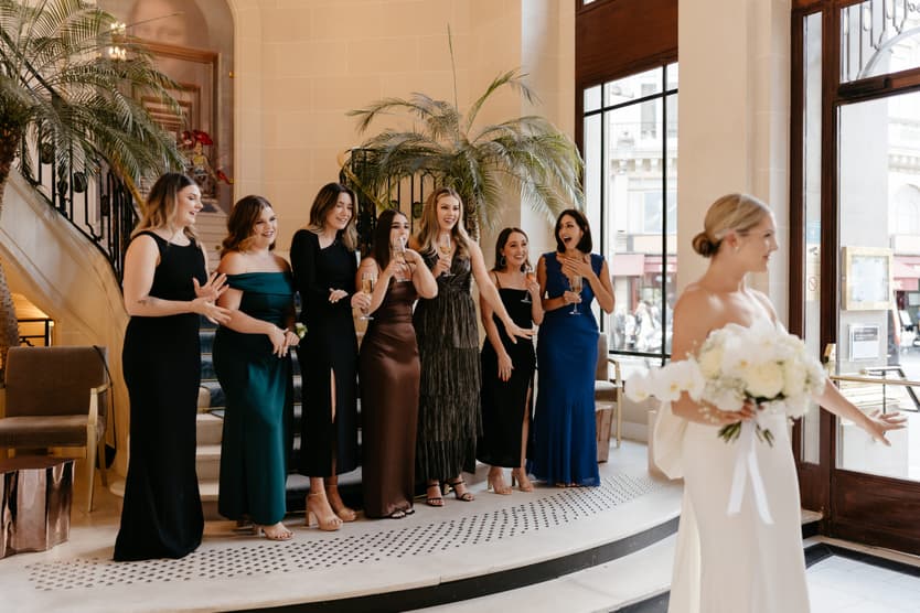 Destination elopement wedding Paris Hotel du Louvre first look with bridesmaids