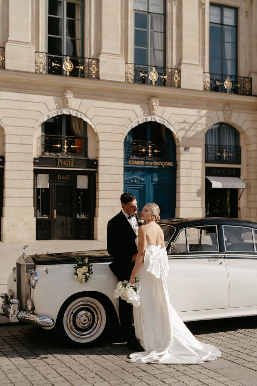 Destination elopement wedding Paris Place Vedome couple with vintage car 
