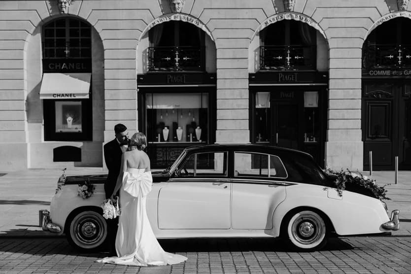 Destination elopement wedding Paris Place Vedome couple with vintage car 