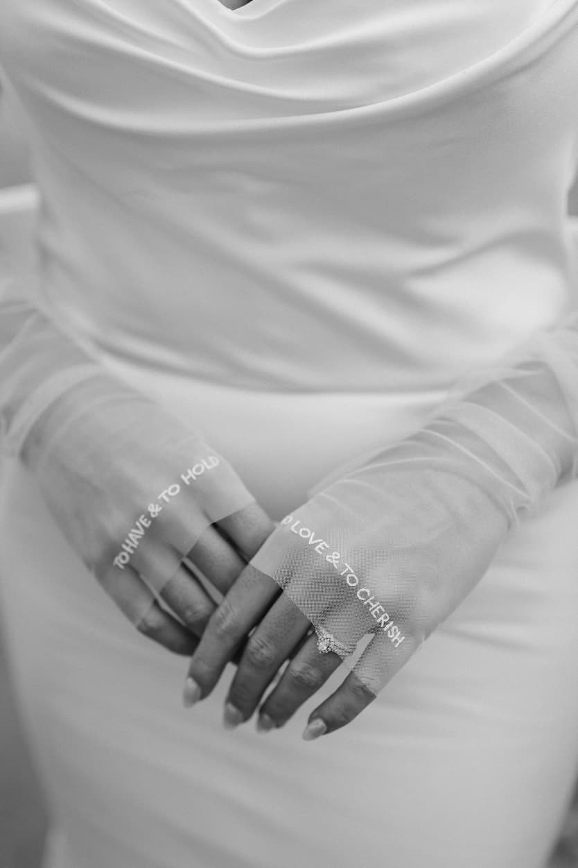 Destination elopement wedding Paris street detail bride's gloves 