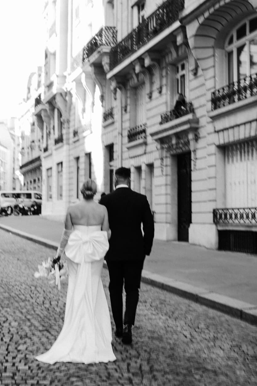 Destination elopement wedding Paris street couple walking 