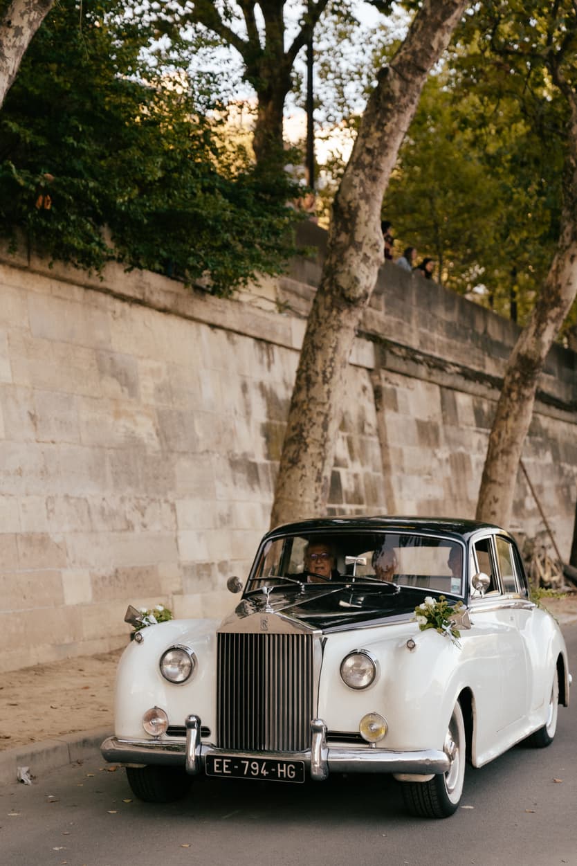 Destination elopement wedding Paris yacht ceremony bride's entrance vintage car 