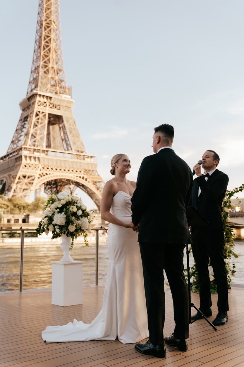 Destination elopement wedding Paris yacht ceremony with Eiffel Tower backdrop