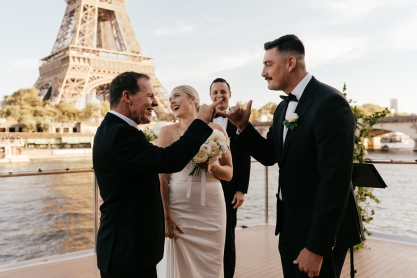 Destination elopement wedding Paris yacht ceremony groom and bride's dad 