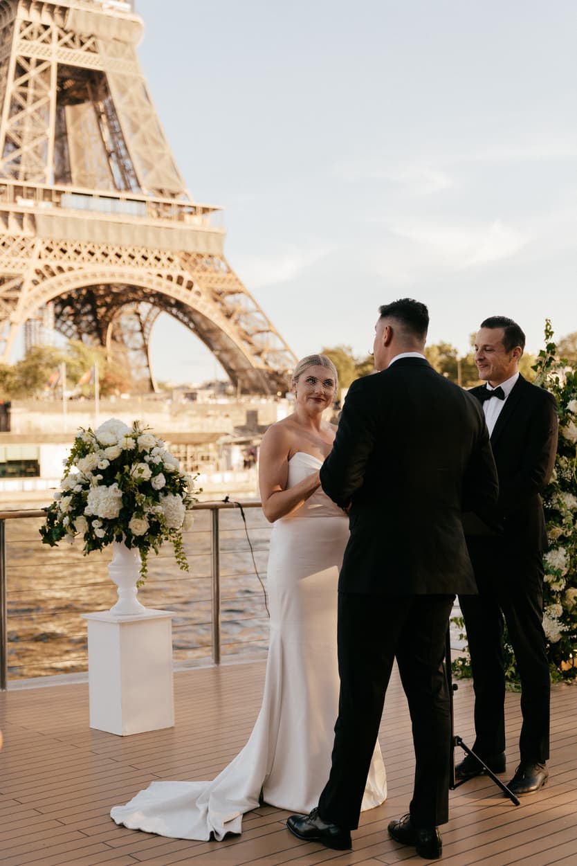 Destination elopement wedding Paris yacht ceremony with Eiffel Tower backdrop