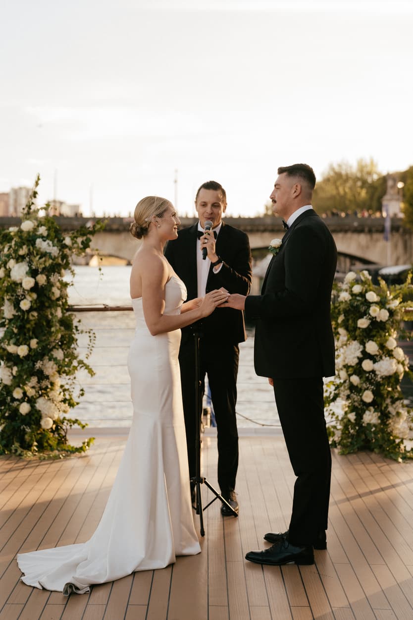 Destination elopement wedding Paris yacht ceremony with Eiffel Tower backdrop