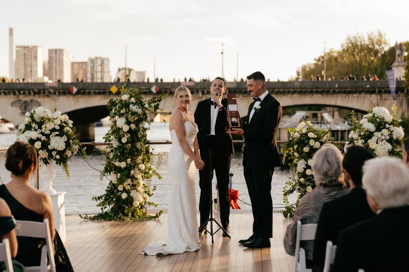 Destination elopement wedding Paris yacht ceremony with Eiffel Tower backdrop