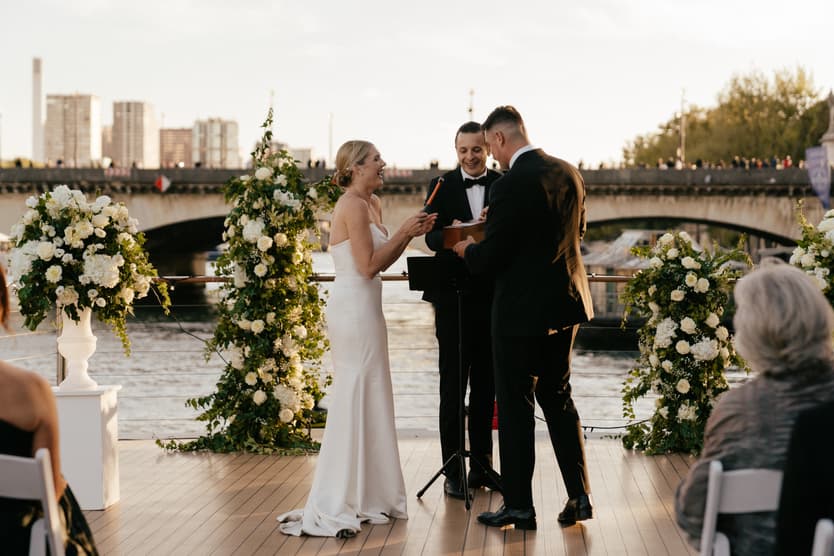 Destination elopement wedding Paris yacht ceremony with Eiffel Tower backdrop