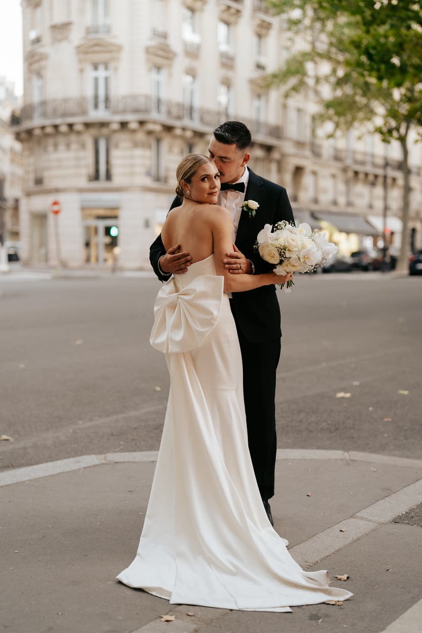 Destination elopement wedding Paris street couple posing