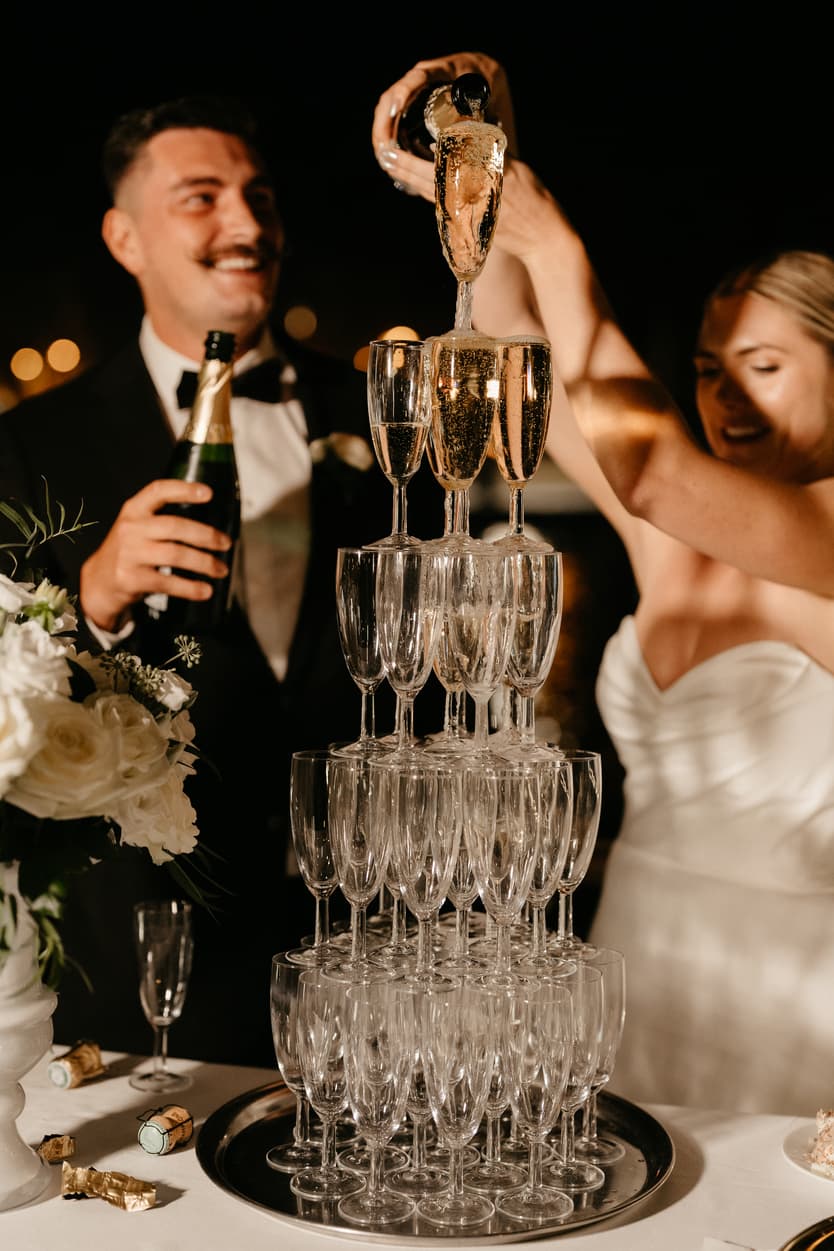 Destination elopement wedding Paris yacht Eiffel Tower Backdrop champagne tower
