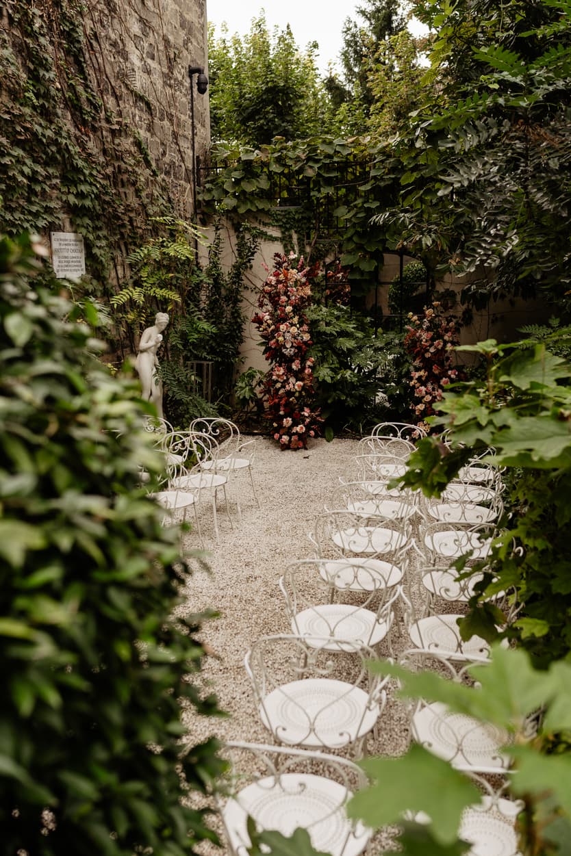 Destination elopement wedding Hotel Particulier Montmartre, Paris garden ceremony decorations