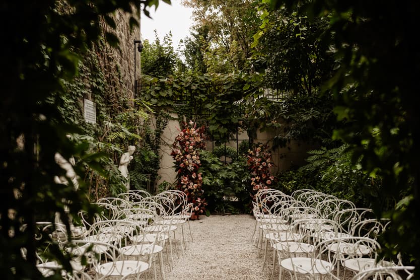 Destination elopement wedding Hotel Particulier Montmartre, Paris garden ceremony decorations 