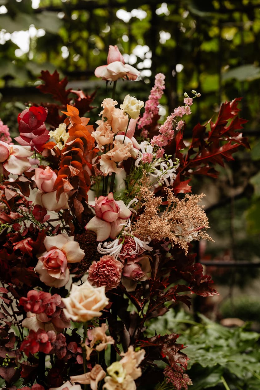 Destination elopement wedding Hotel Particulier Montmartre, Paris garden ceremony flower decorations 