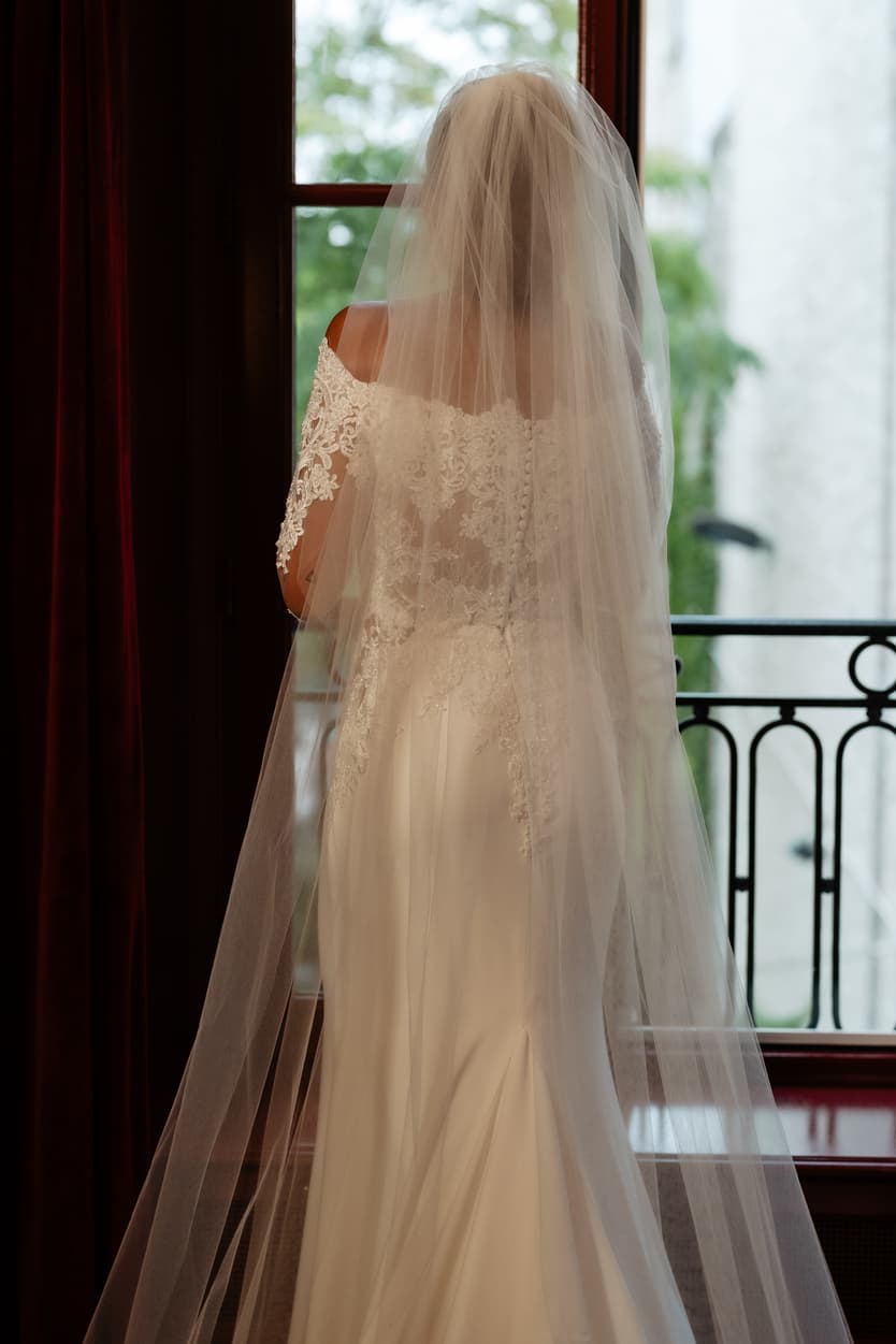 Destination elopement wedding Hotel Particulier Montmartre, Paris preparations bride with gown 