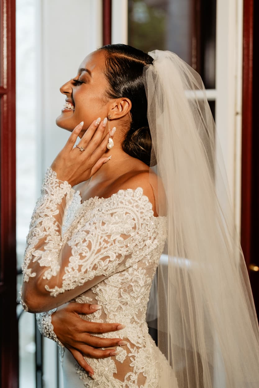 Destination elopement wedding Hotel Particulier Montmartre, Paris preparations bride  laughing 