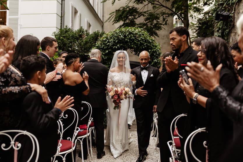 Destination elopement wedding Hotel Particulier Montmartre, Paris garden ceremony bride walking with her dad 
