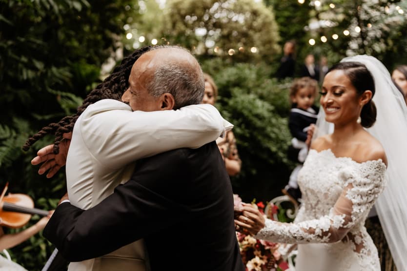 Destination elopement wedding Hotel Particulier Montmartre, Paris garden ceremony groom and father-in-law 