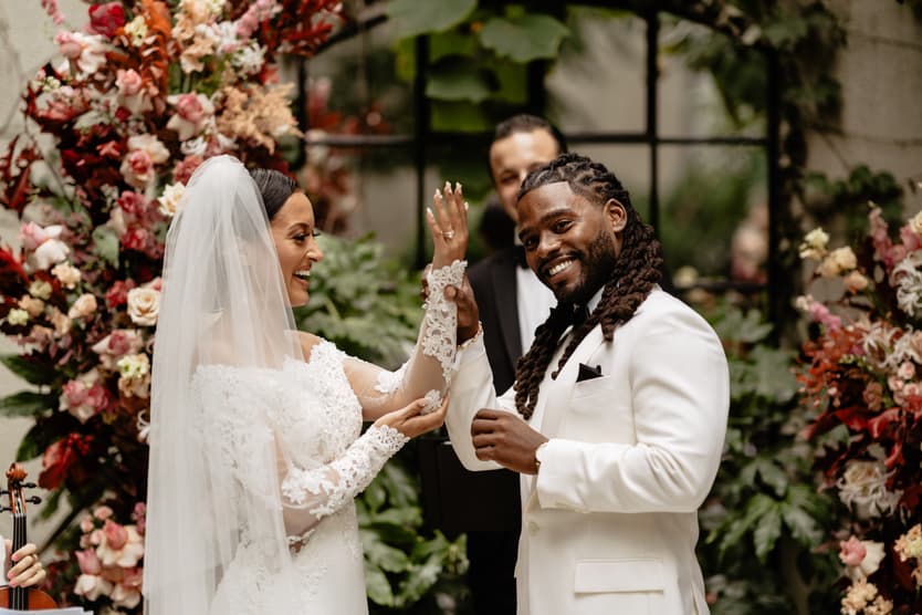 Destination elopement wedding Hotel Particulier Montmartre, Paris garden ceremony exchanging rings 