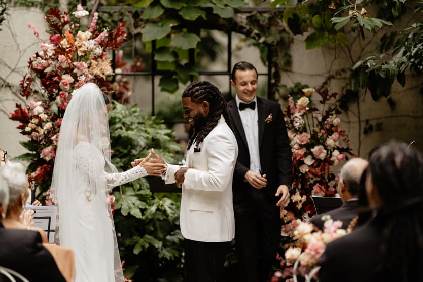 Destination elopement wedding Hotel Particulier Montmartre, Paris garden ceremony couple's handshake
