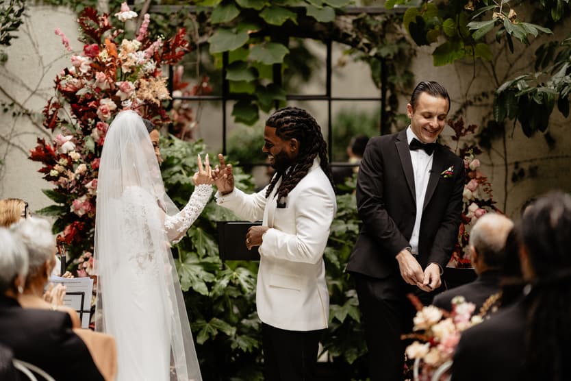 Destination elopement wedding Hotel Particulier Montmartre, Paris garden ceremony couple's handshake