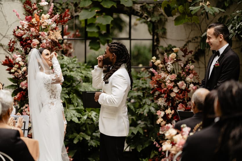 Destination elopement wedding Hotel Particulier Montmartre, Paris garden ceremony couple's handshake