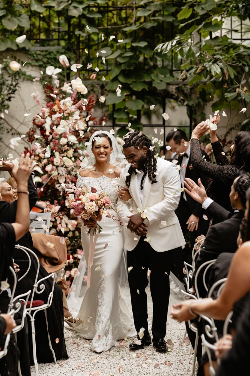 Destination elopement wedding Hotel Particulier Montmartre, Paris garden ceremony petal toss