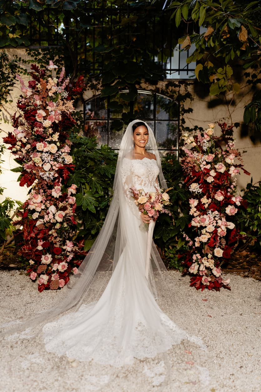 Destination elopement wedding Hotel Particulier Montmartre, Paris bride near the flower decorations